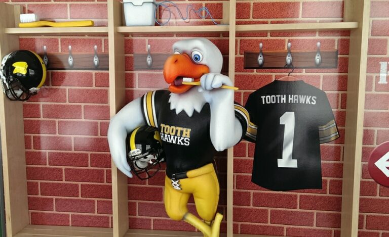 Sculpted football player eagle mascot.