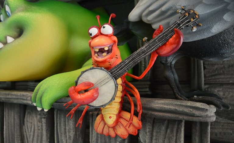 A detailed view of a sculpted crawfish character playing the banjo