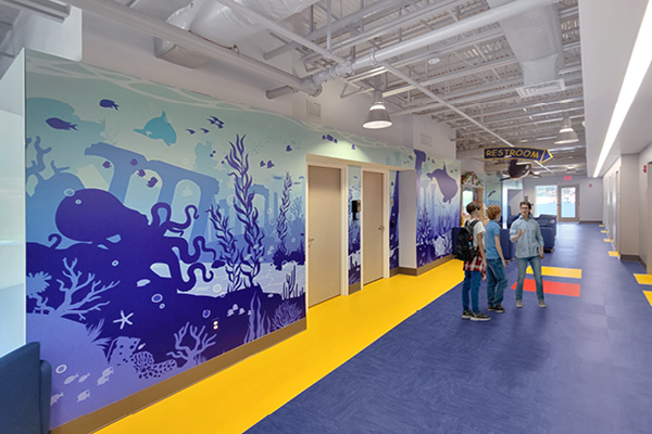Teen hangout area - church classroom hallway with underwater silhouette murals.