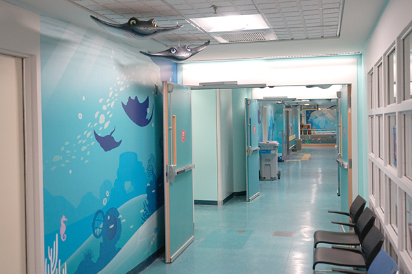 Underwater themed hallway murals hospital decor.