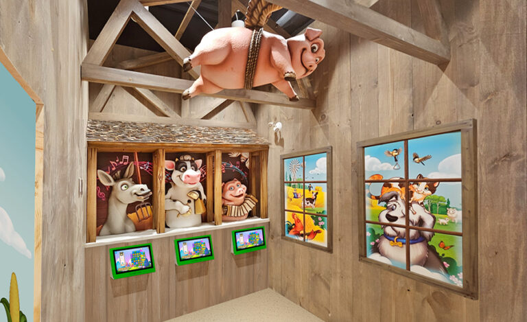 A whimsical children's play area in a dental office features cartoon animal figures, including a flying pig and barn animals peeking from stalls, with interactive screens and colorful murals viewed through wooden-framed windows.